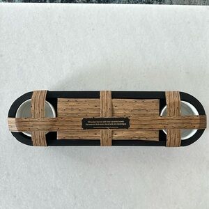 Wooden Server with two ceramic bowls and it has legs.